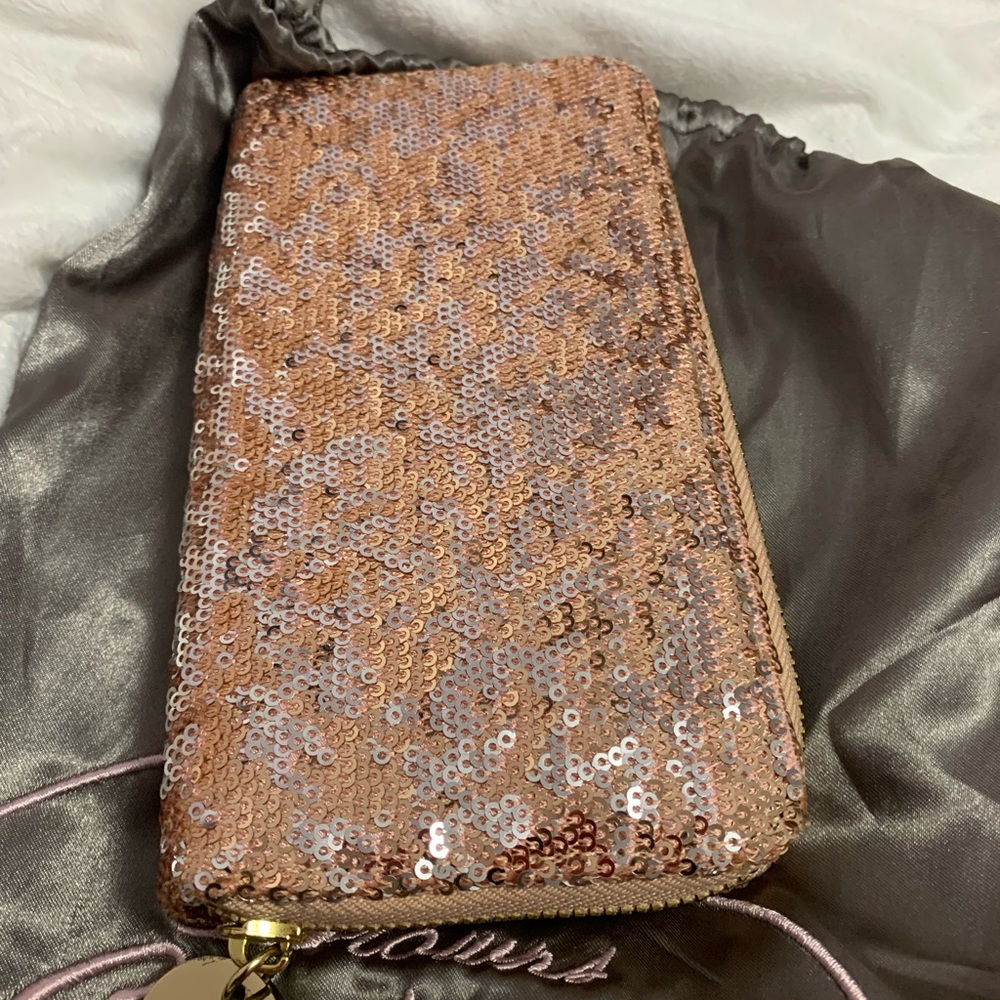 Beautiful rose gold sequinned clutch